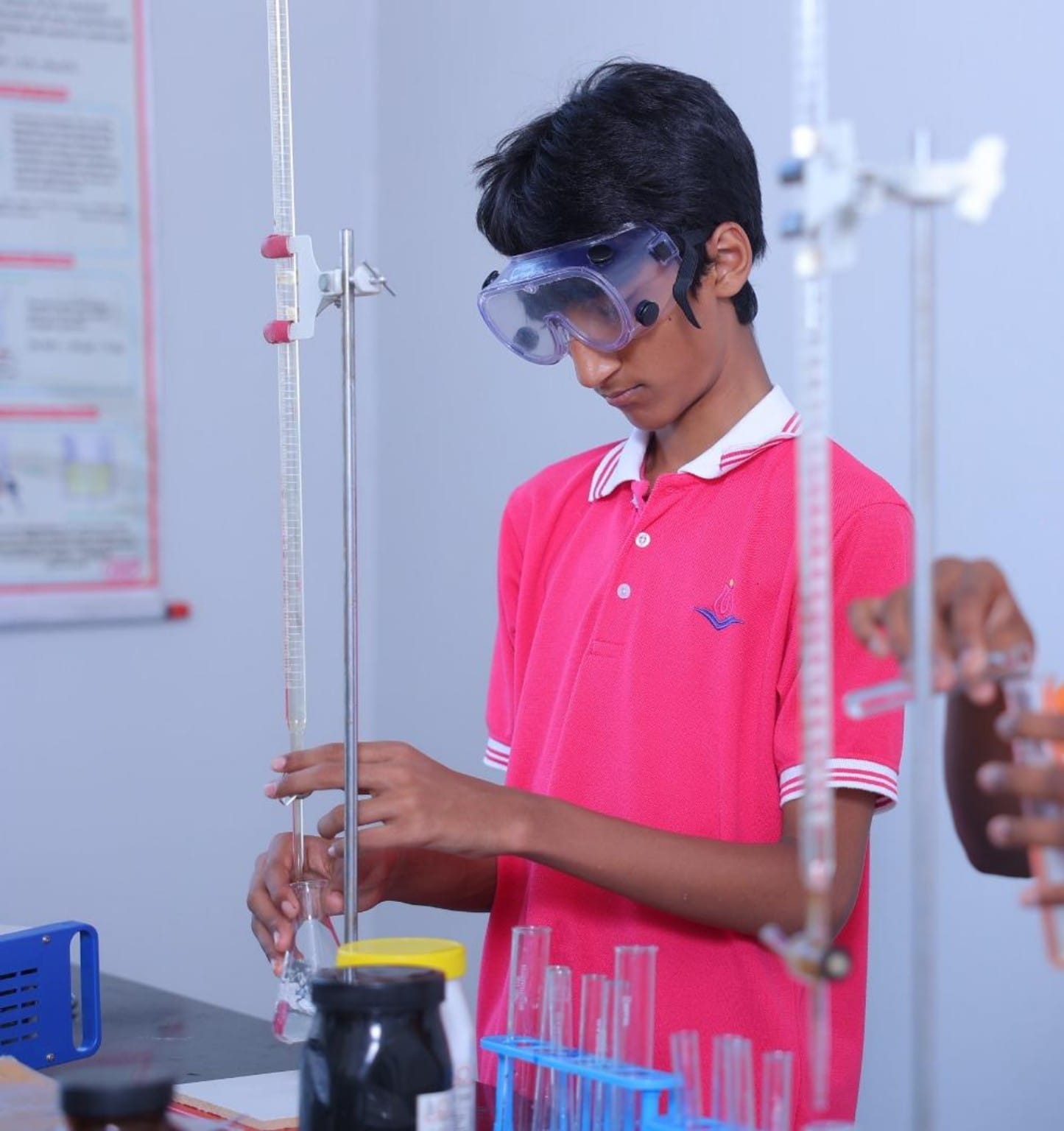 iLead student conducting a hands-on science experiment